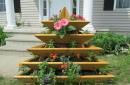 نحوه انتخاب و تزئین تخت گل در حیاط یک خانه خصوصی: عکس ها، نکات مفید و طرح های منحصر به فرد اشکال تخت گل DIY